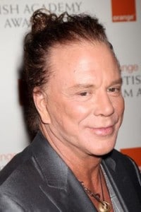 Mickey Rourke sporting his obvious Pixie-ear and man-bun on the red carpet